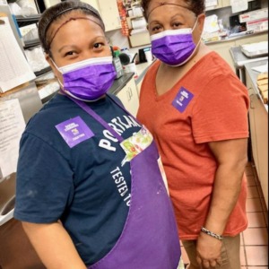 nursing home workers in masks and work uniforms